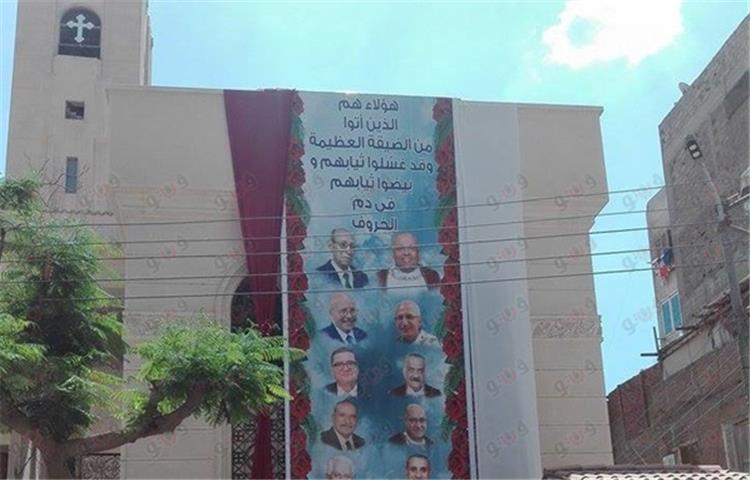 تعليق صور شهداء «مارجرجس» على كنيسة طنطا